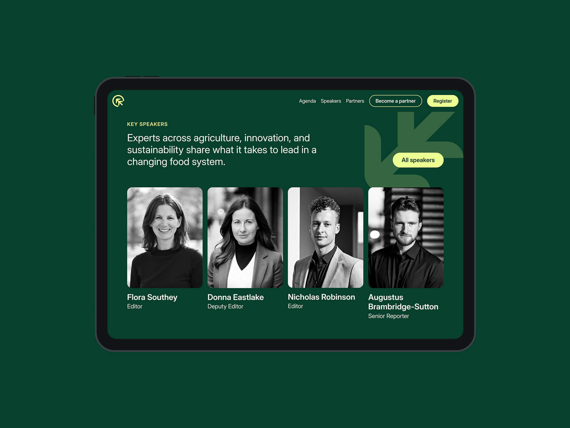 A laptop screen of the website homepage speakers section