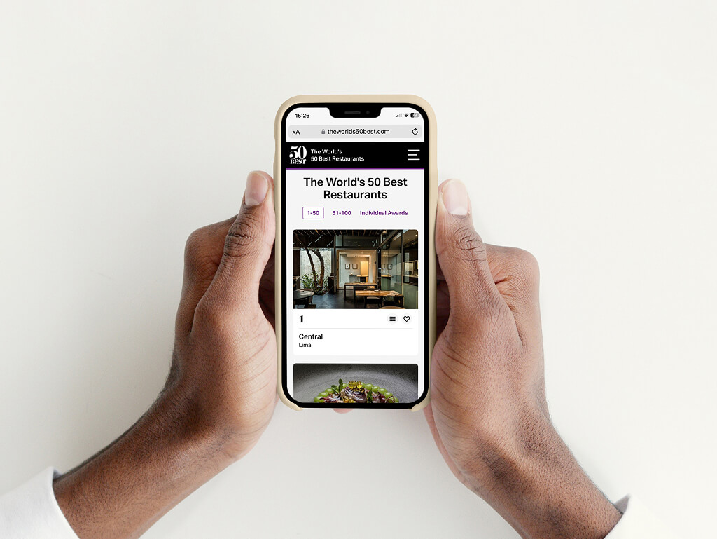 A picture of someone scrolling a phone using the The World's 50 Best Preference Centre