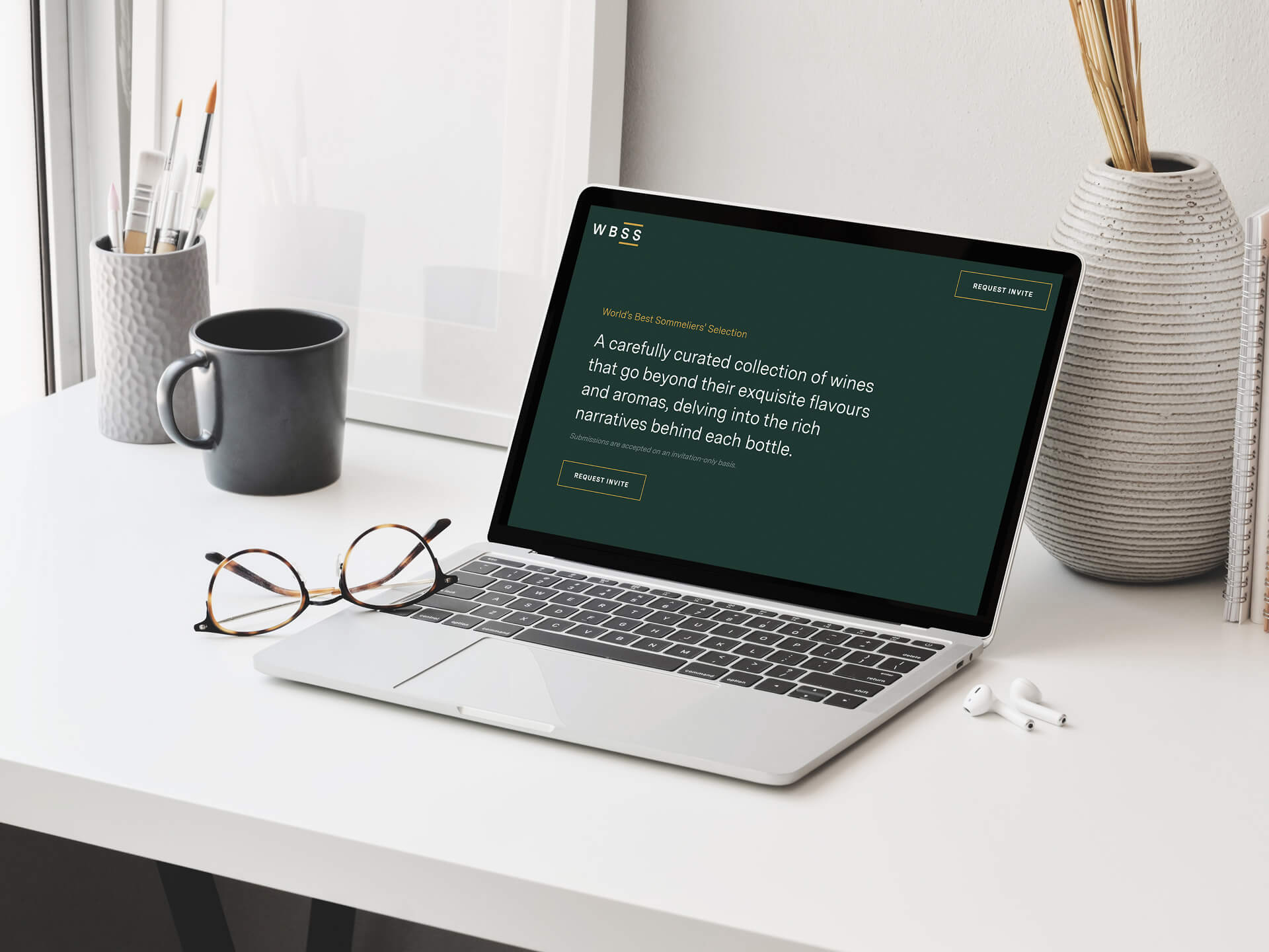 WBSS homepage screen on an open laptop